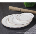 white ceramic hotel dinner plate